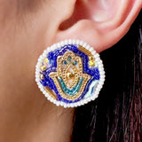 Arete mano hamsa